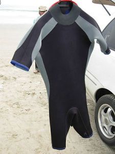 Shorty wetsuit hainging to dry